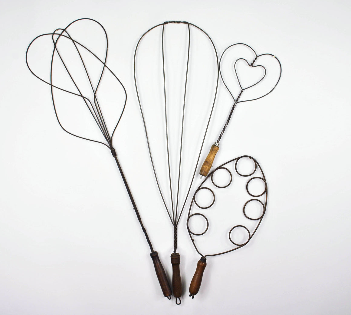 Four Antique 1900s Wire Rug Beaters with Trivet Heart Design and Wood Handles